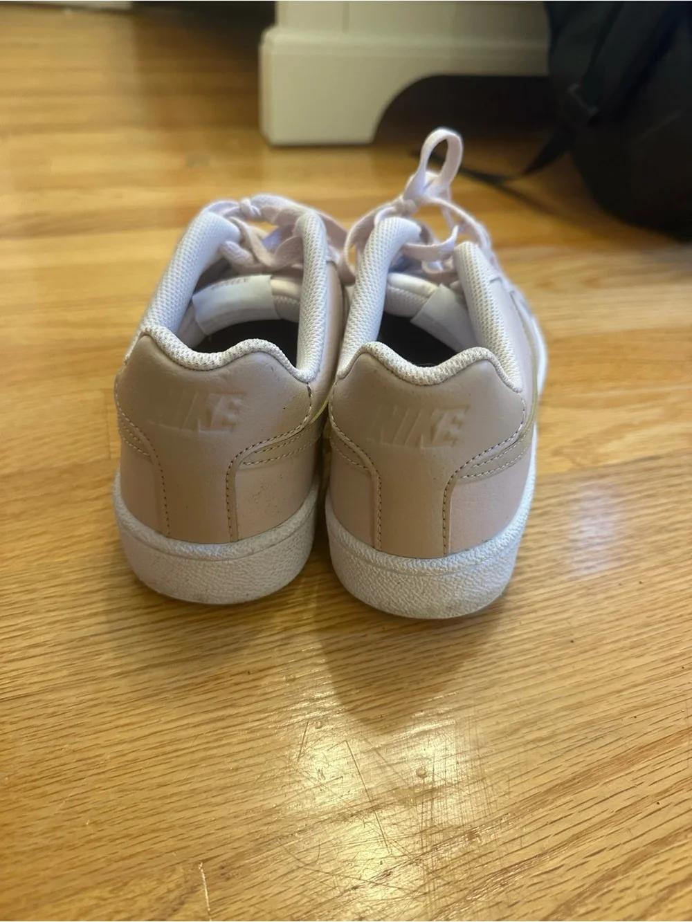 Nike Pale Pink Leather Low-Top Sneakers with Cream Swoosh